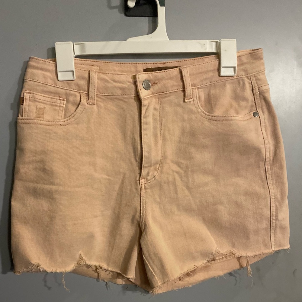 Light pink Judy Blue stretch jean cut off shorts